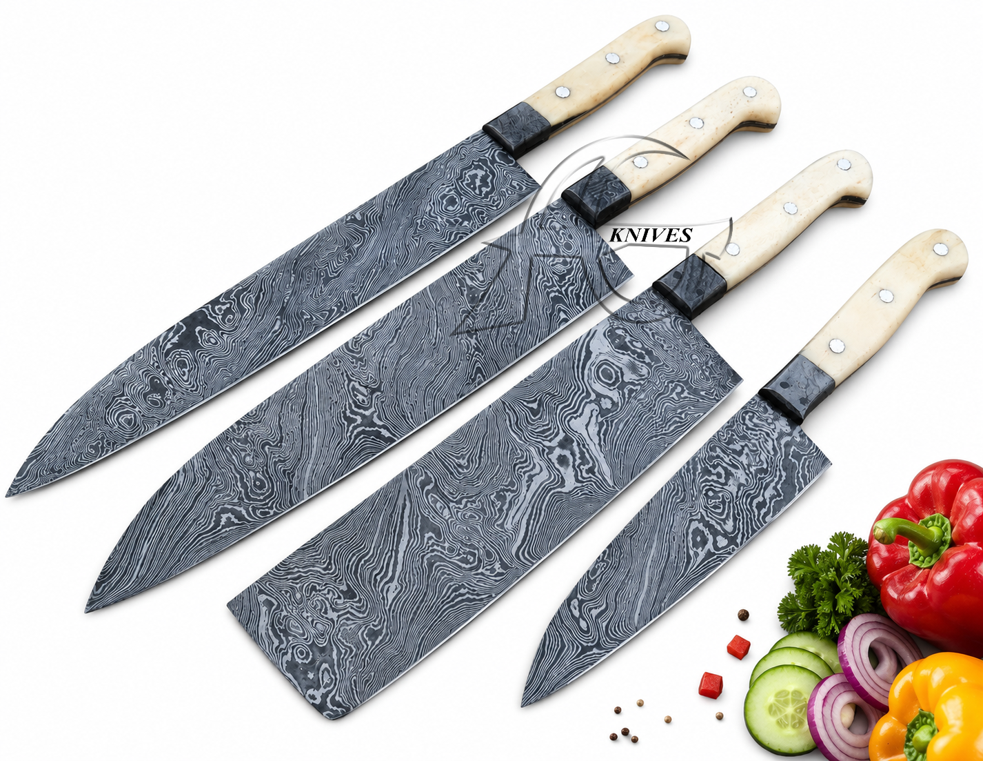 Four kitchen knives with patterned Damascus steel blades and cream-colored handles, arranged diagonally on a white background with vegetables in the corner.