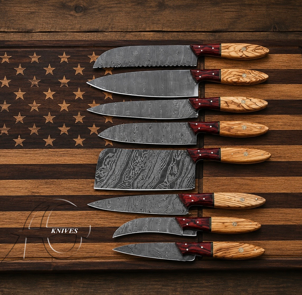 A set of eight kitchen knives with patterned steel blades and light wood handles, arranged vertically on a rustic wooden surface featuring a partially visible American flag design.