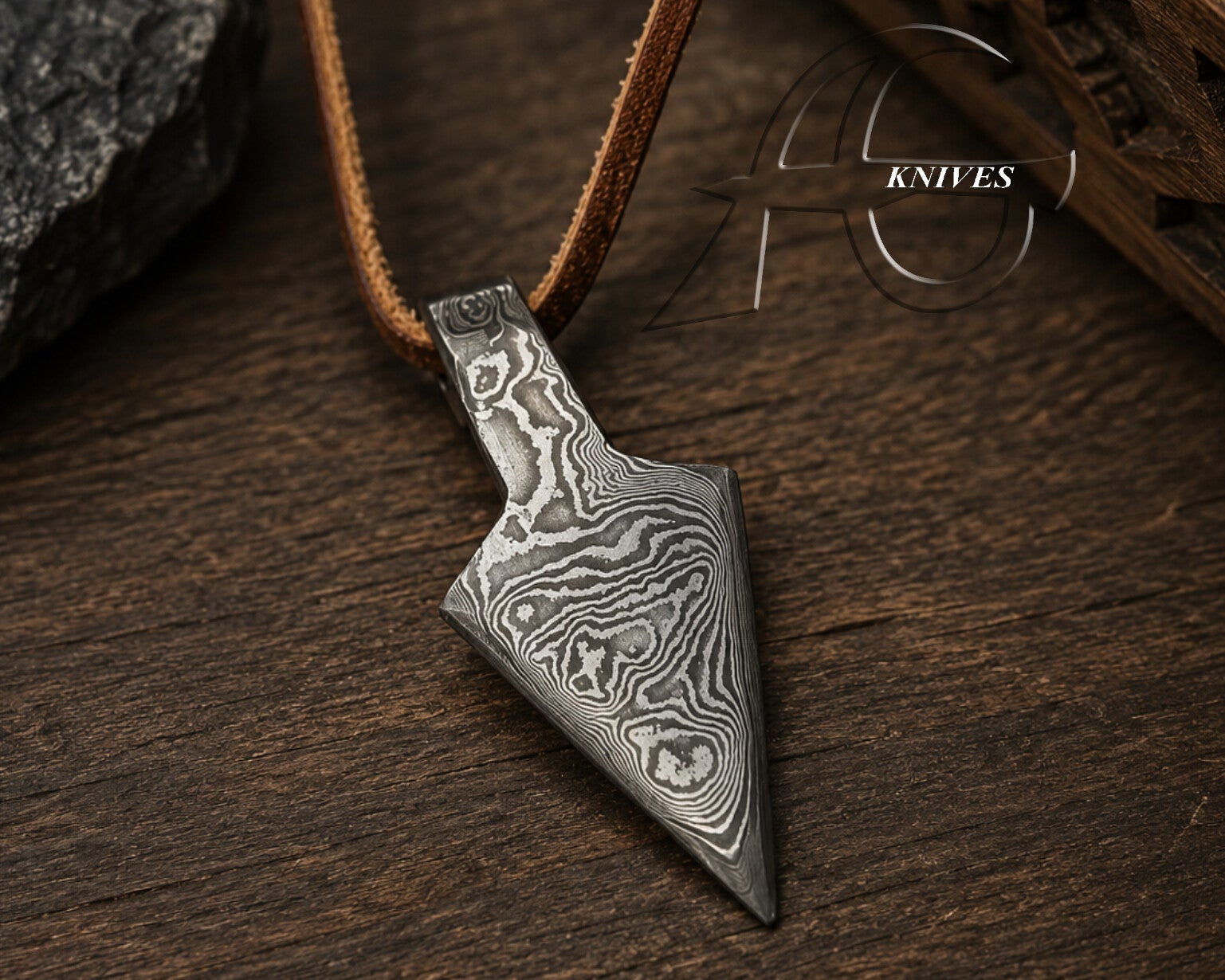 handcrafted damascus spearhead point pendant with leather core 