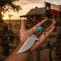 A hand holds a fixed-blade knife with a silver blade and a dark wood handle featuring a turquoise band, set against a rustic ranch background at sunset with a Texas flag and 'Lone Star Ranch' sign.